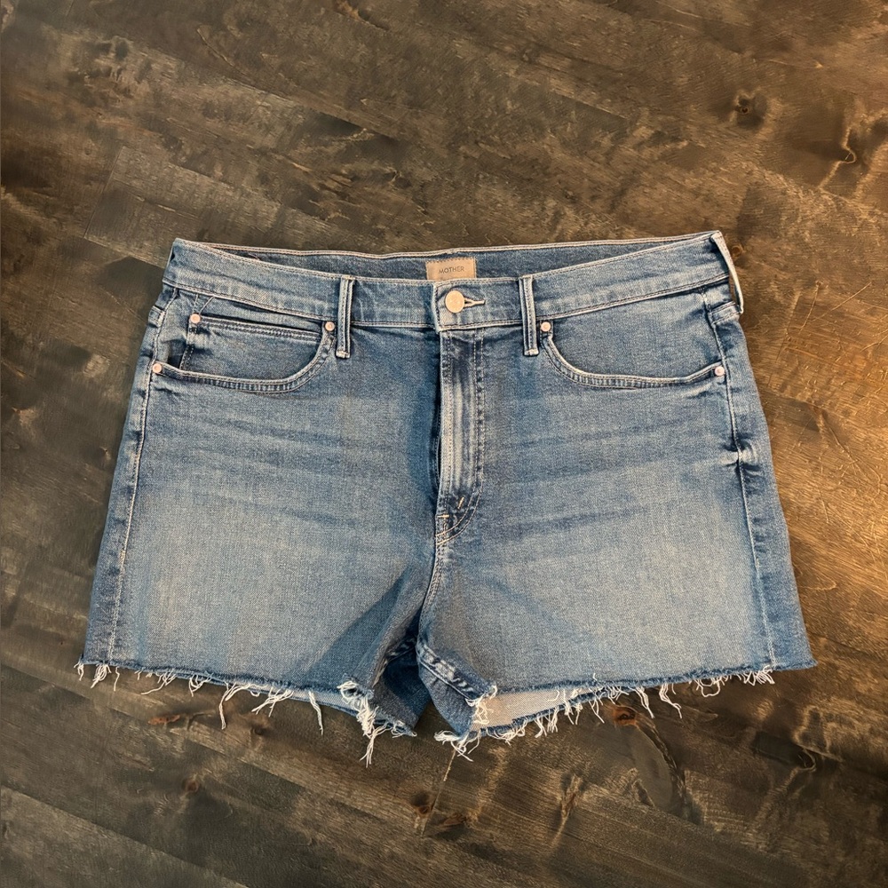 MOTHER Medium Wash Denim Cutoff Shorts